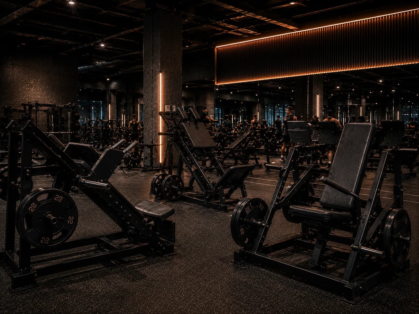 Plate-loaded machine at Inception Gym Christchurch with weight plates loaded and ready for use
