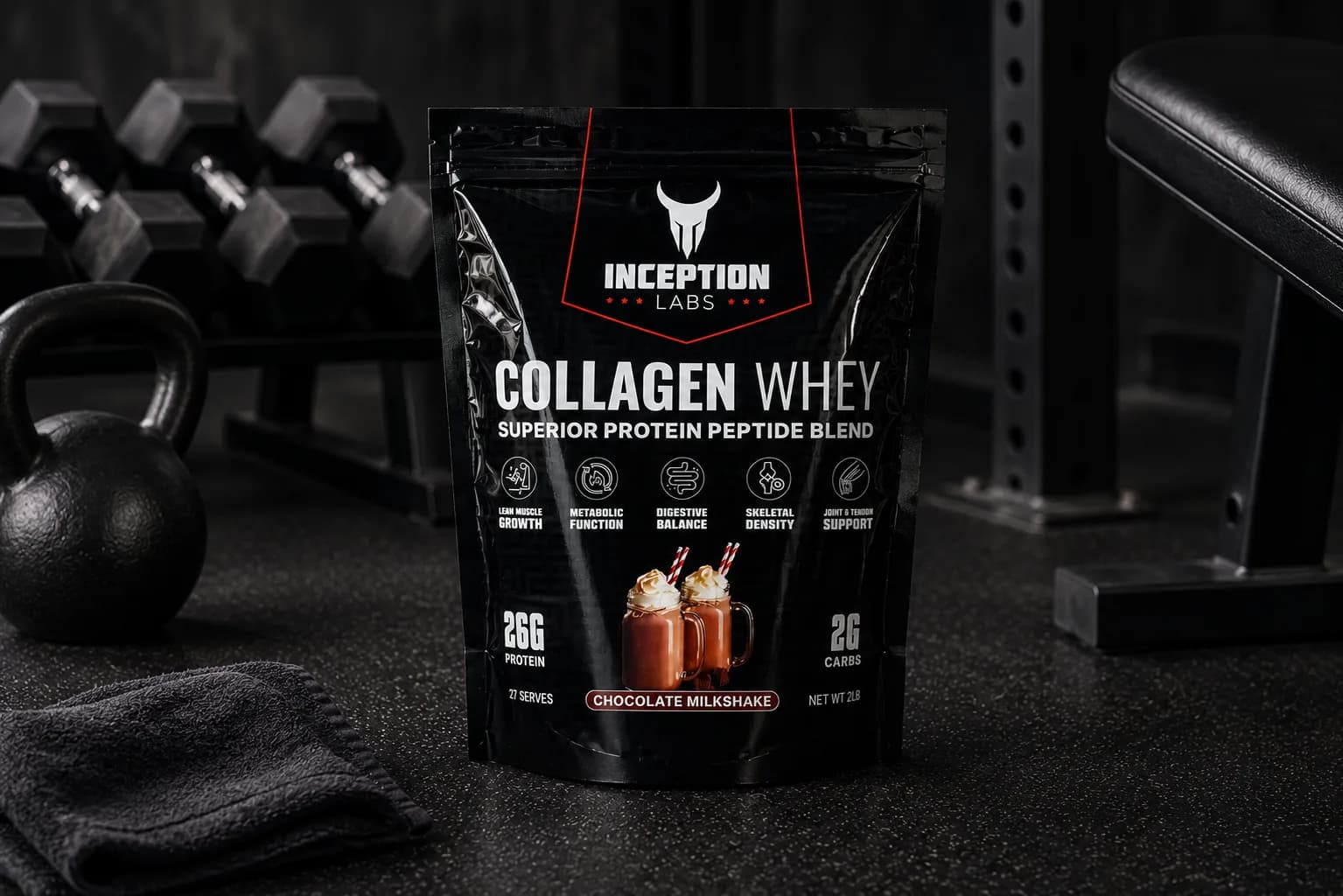 Inception Labs Collagen Whey chocolate milkshake protein pouch on the gym floor beside dumbbells and a kettlebell at Inception Gym Christchurch